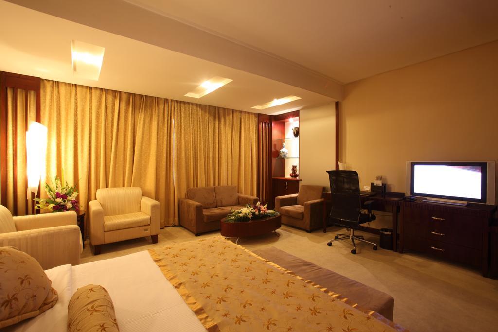 Beijing Wuhuan Hotel Kamer foto