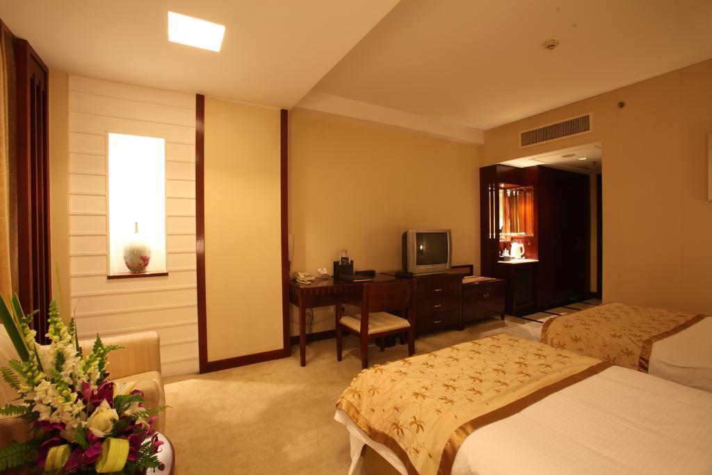 Beijing Wuhuan Hotel Kamer foto