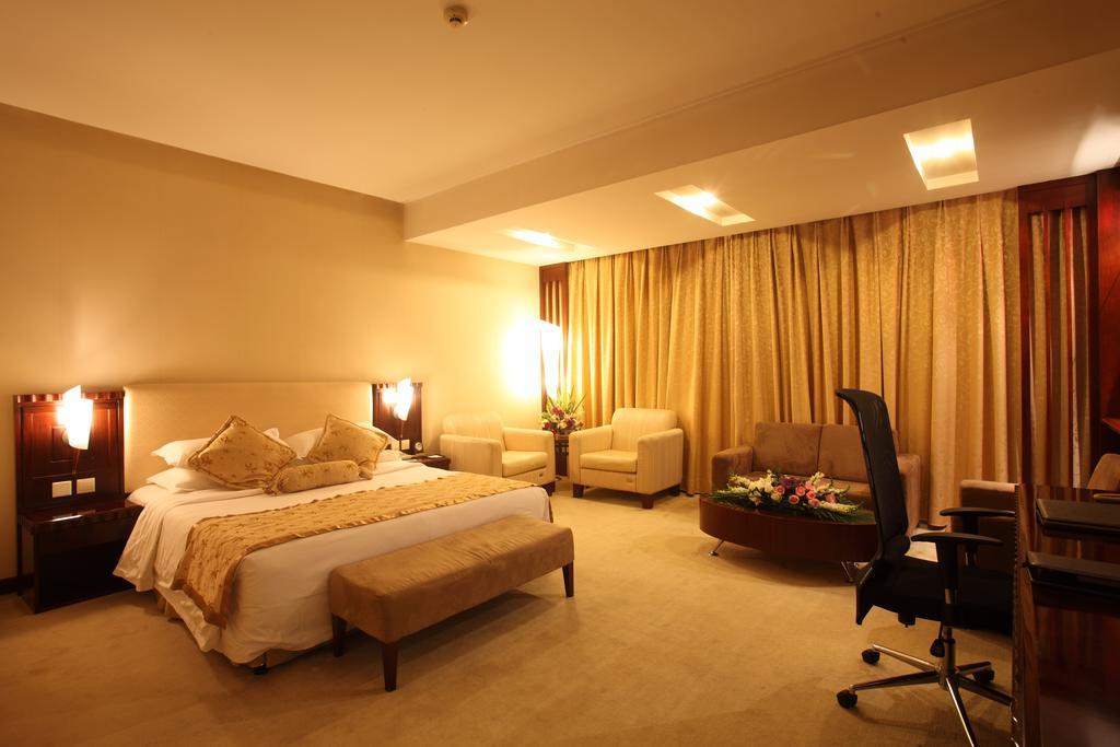 Beijing Wuhuan Hotel Kamer foto