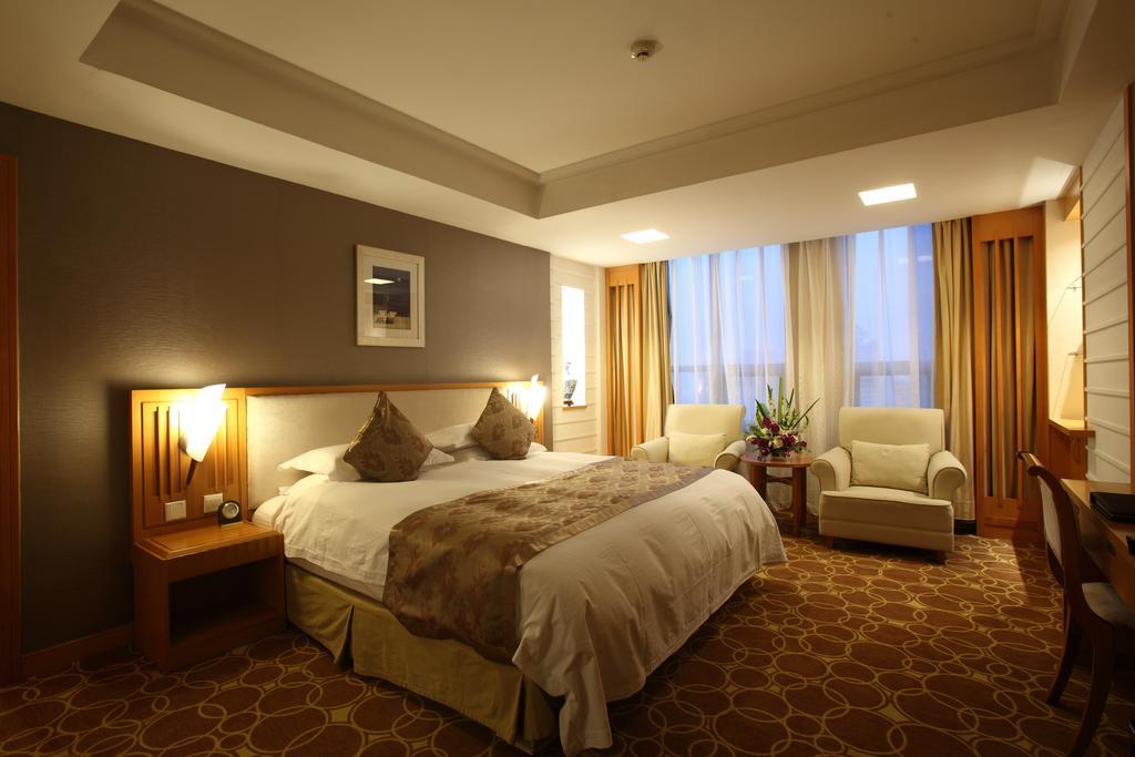 Beijing Wuhuan Hotel Kamer foto