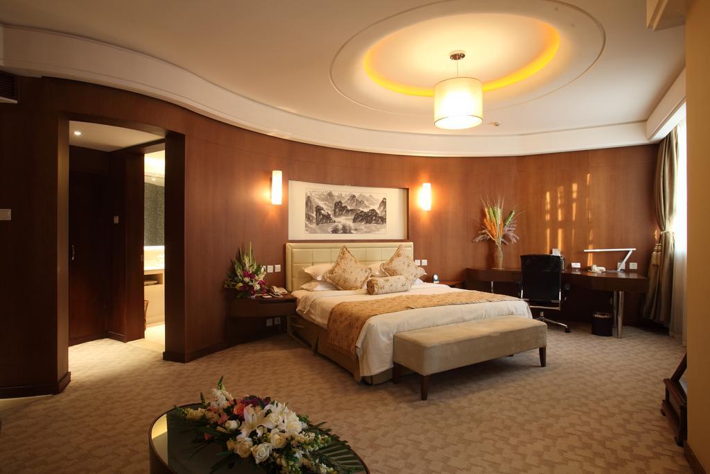 Beijing Wuhuan Hotel Kamer foto