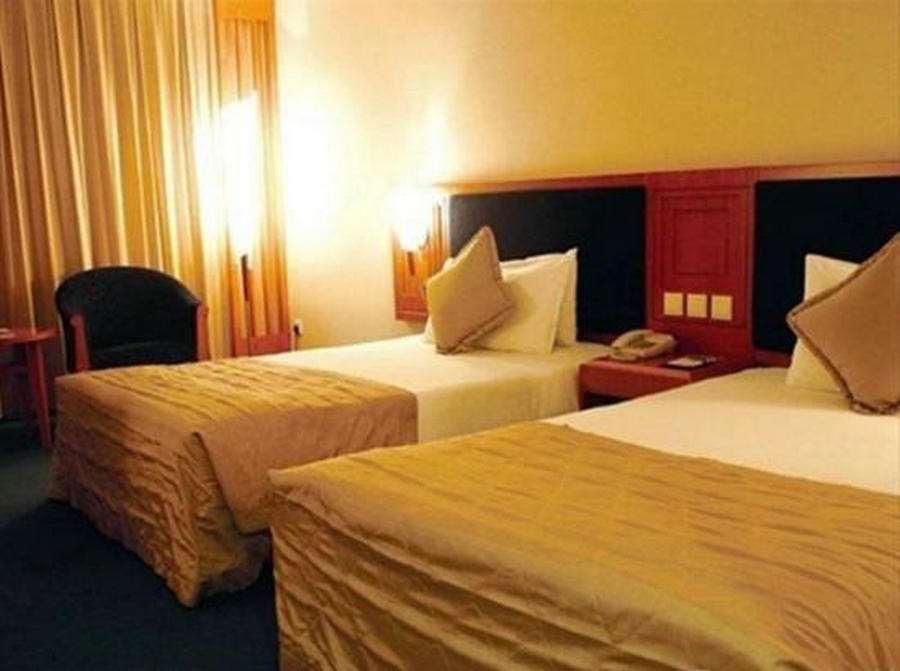 Beijing Wuhuan Hotel Kamer foto