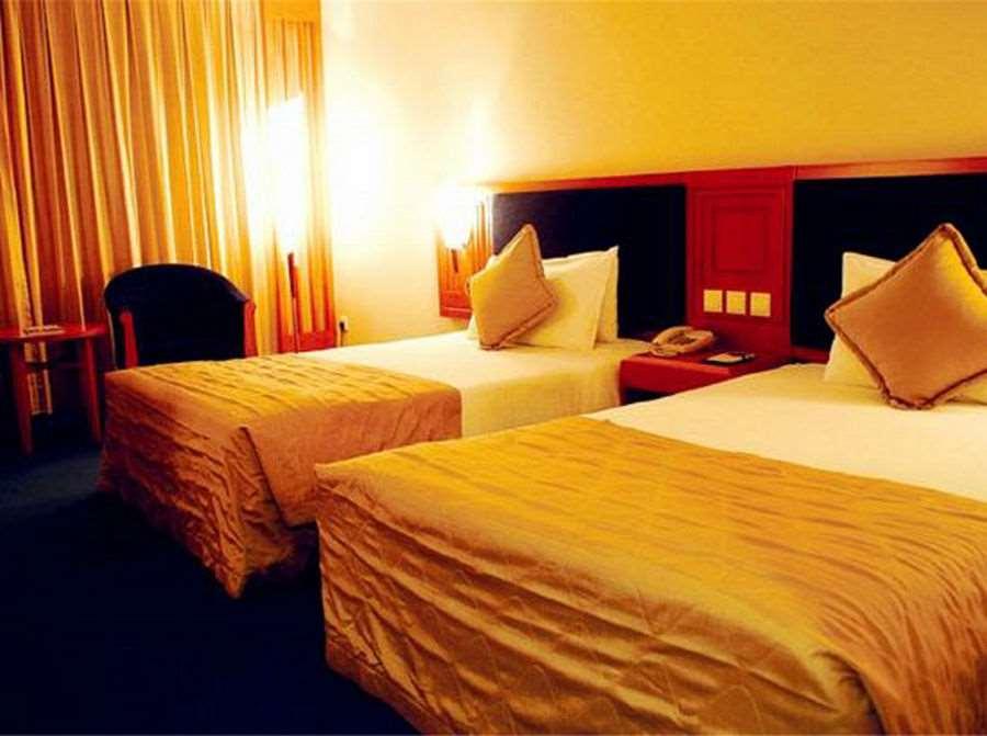 Beijing Wuhuan Hotel Kamer foto
