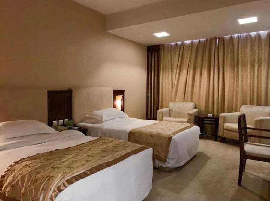 Beijing Wuhuan Hotel Kamer foto