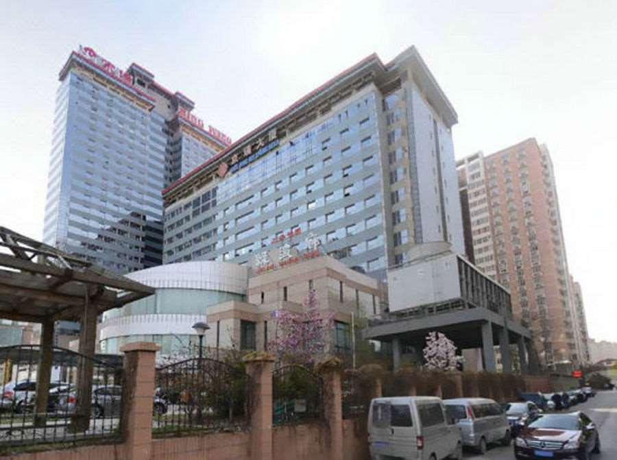 Beijing Wuhuan Hotel Buitenkant foto