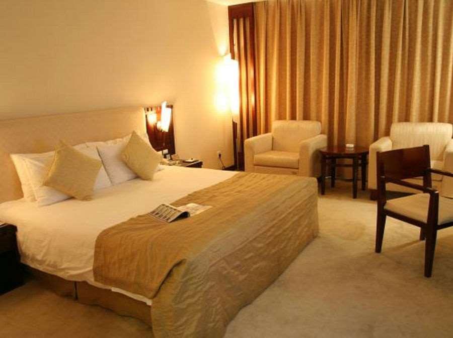 Beijing Wuhuan Hotel Kamer foto