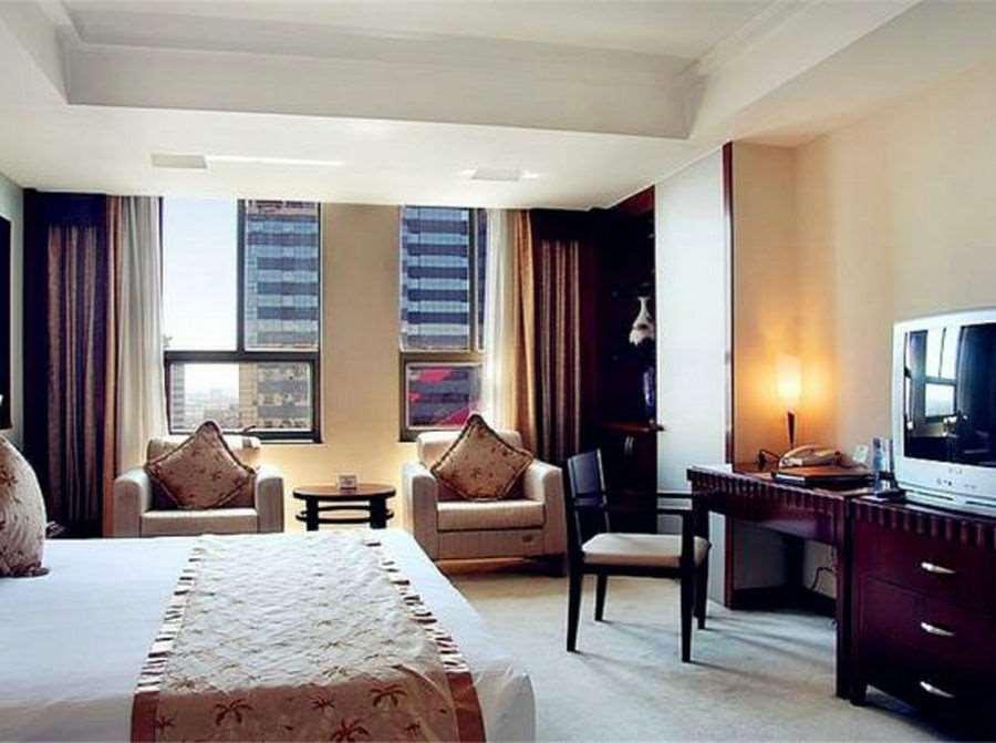Beijing Wuhuan Hotel Kamer foto