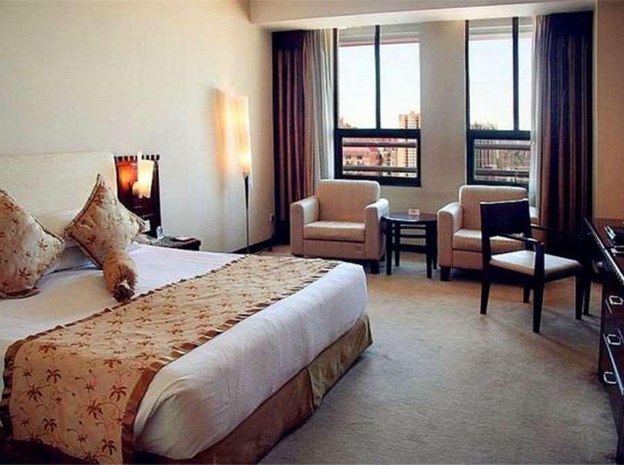 Beijing Wuhuan Hotel Kamer foto